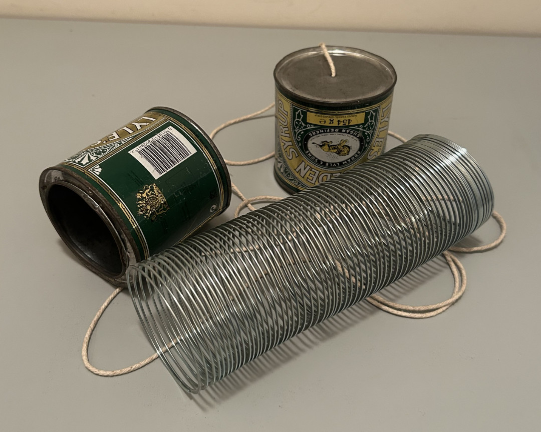 Tin-can telephone and slinky